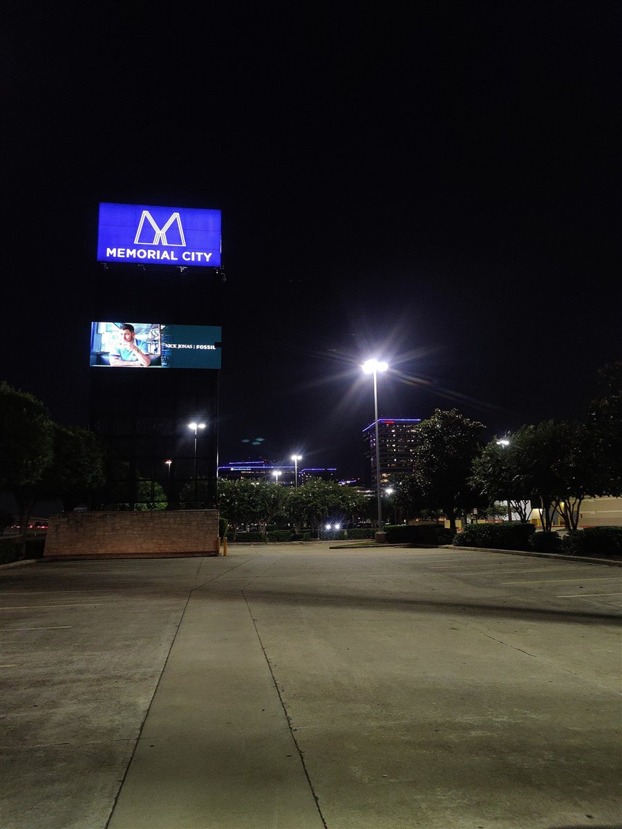 Memorial City Mall exterior sign at night